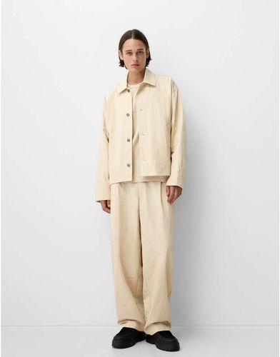 Collection - Pantalon d'ensemble en maille texturée coupe ajustée - Écru - Bershka - Modalova