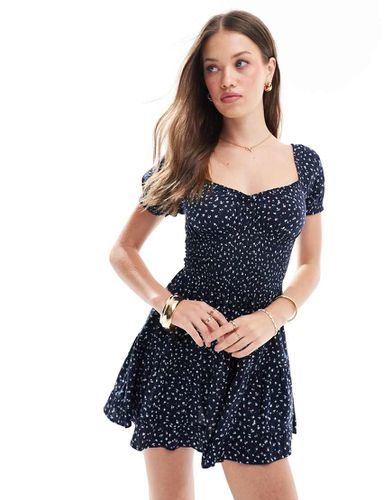 Robe courte tendance folk à manches bouffantes - Bleu marine et fleuri - Bershka - Modalova