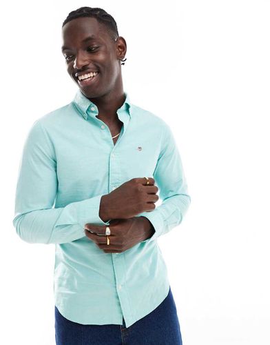 Chemise Oxford coupe slim à logo écusson brodé - menthe - Gant - Modalova