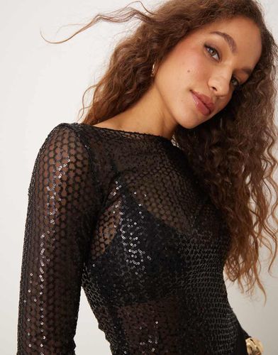 Top transparent à sequins avec manches longues et encolure bateau - Gina Tricot - Modalova