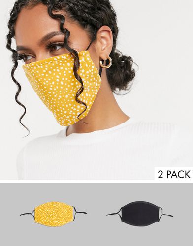 Lot de 2 masques en tissu avec sangles ajustables - Noir et imprimé à pois ocres - DesignB London - Modalova