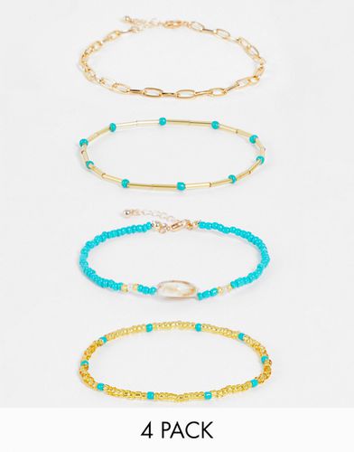 Lot de 4 bracelets de cheville à perles et coquillages - Designb London - Modalova