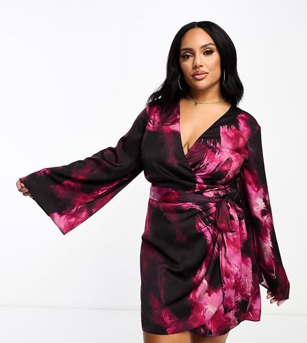 Exclusivité ASOS DESIGN Curve - Robe portefeuille courte en satin avec lien à nouer à la taille et imprimé abstrait - Asos Curve - Modalova