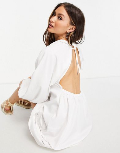 Robe babydoll courte en coton avec cordon de serrage à l'encolure - Fashion Union - Modalova