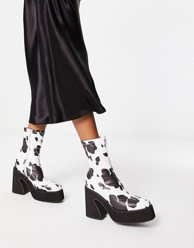 Koi - Holy - Bottines à imprimé vache avec semelle chunky et talon - Koi Footwear - Modalova