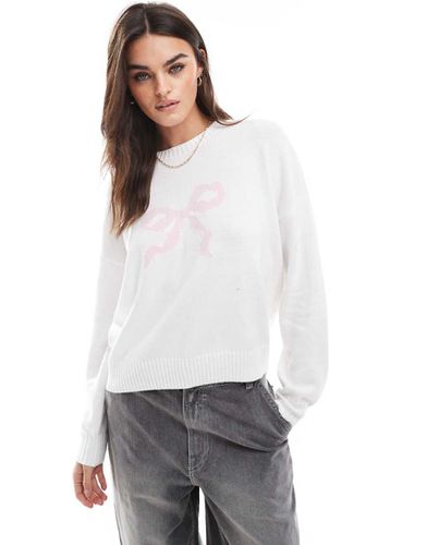 Pull en maille avec naud rose - Hollister - Modalova