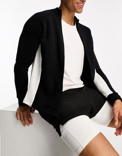 Veste de survêtement ajustée à zip style color-block - Hiit - Modalova