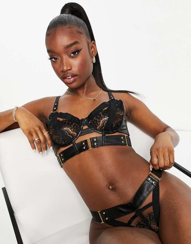 Occult - Soutien-gorge non rembourré en dentelle avec lanières en polyuréthane et éléments métalliques - Hunkemoller - Modalova