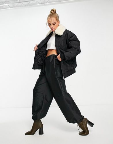 Bomber en nylon avec col en fausse fourrure - Other Stories - Modalova