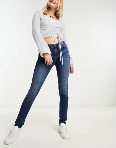 Jean skinny avec logo et imprimé caur - moyen délavé - Love Moschino - Modalova