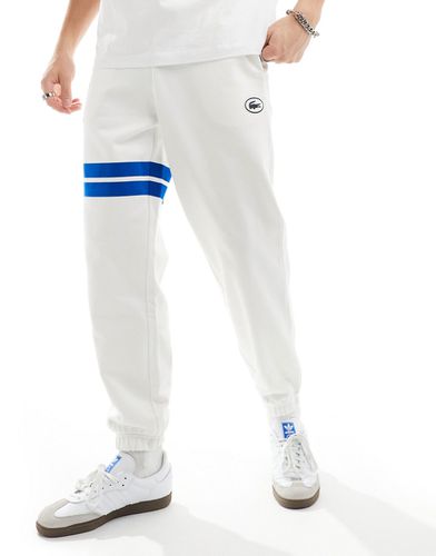 Pantalon de jogging à logo avec rayures contrastantes - Lacoste - Modalova