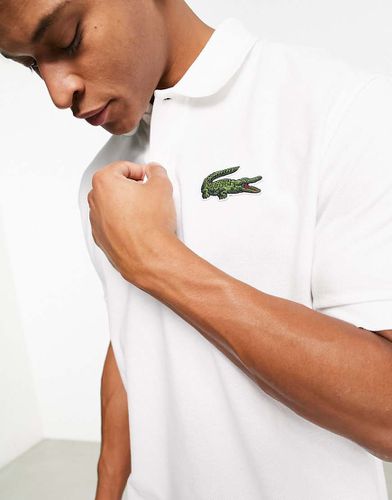 Polo ample à grand logo - Lacoste - Modalova