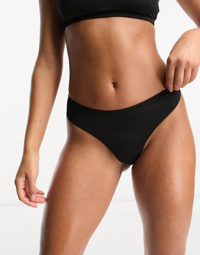 Bas de bikini d'ensemble coupe string - Monki - Modalova