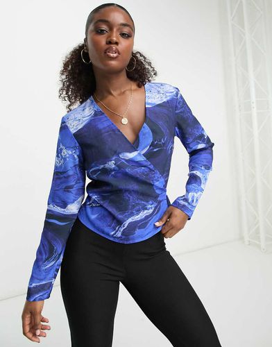 Blouse cache-caur nouée à la taille à imprimé liquide - Monki - Modalova