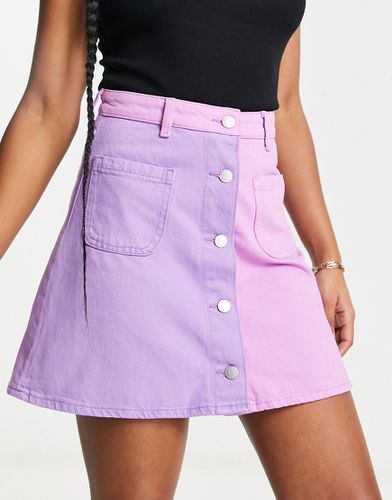Mini-jupe en jean effet color block - Lilas - Monki - Modalova