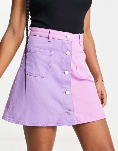 Mini-jupe en jean effet color block - Lilas - Monki - Modalova