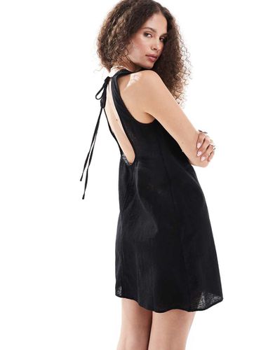 Robe courte en lin mélangé avec dos ouvert et liens - Monki - Modalova