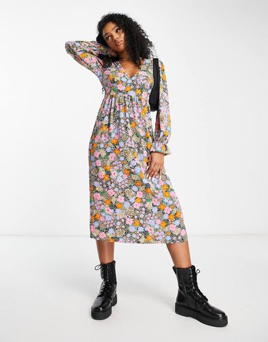 Robe mi-longue à fleurs avec manches longues - Monki - Modalova