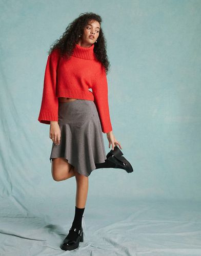 Mini-jupe ajustée à ourlet asymétrique - Miss Selfridge - Modalova