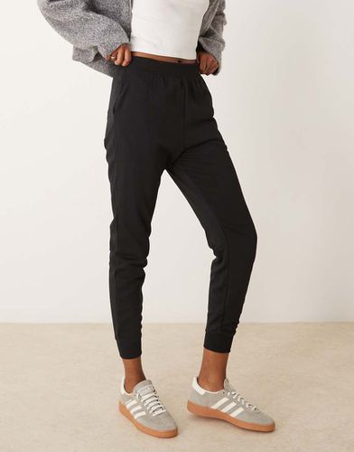 Pantalon de jogging coupe slim resserré aux chevilles - New Look - Modalova