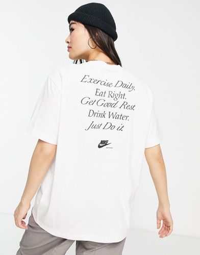 T-shirt coupe boyfriend avec inscription imprimée au dos - Nike - Modalova