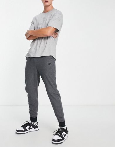 Tech - Pantalon de jogging d'hiver en polaire - Gris anthracite - Nike - Modalova