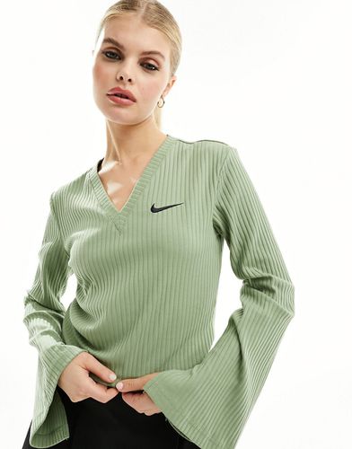 Top tendance à manches longues et col en V en jersey côtelé - pétrole - Nike - Modalova