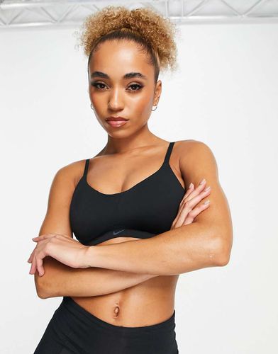 Alate Minimalist - Brassière de sport soutien léger en tissu Dri-FIT à séchage rapide - Nike Training - Modalova