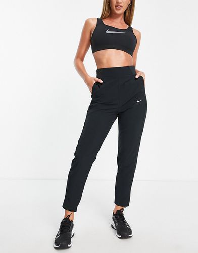 Bliss Victory - Jogger taille mi-haute en tissu Dri-FIT - Nike Training - Modalova