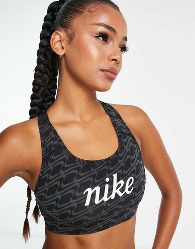 Icon Clash - Soutien-gorge de sport maintien moyen à imprimé graphique - Nike Training - Modalova