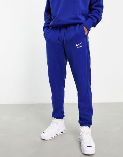 Ensemble nike homme bleu hot sale