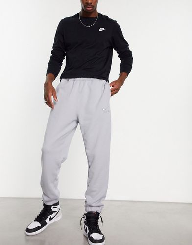 Jogging Nike Gris pour Homme