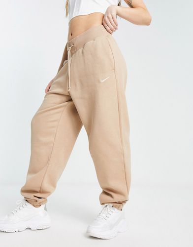 Pantalon de jogging oversize à taille haute et petit logo virgule - Marron chanvre - Nike - Modalova