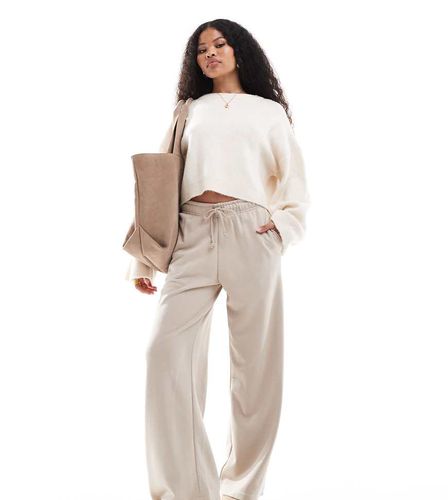 Petite - Pantalon de jogging large - Beige - Stradivarius - Modalova