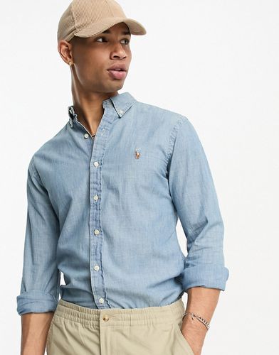 Chemise coupe slim en chambray à logo emblématique - Délavage clair - Polo Ralph Lauren - Modalova