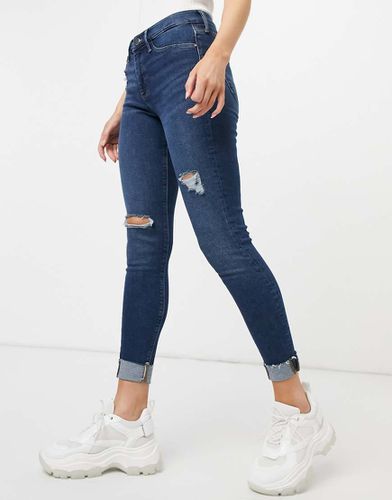 Molly - Jean skinny déchiré à ourlet brut - foncé authentique - River Island - Modalova