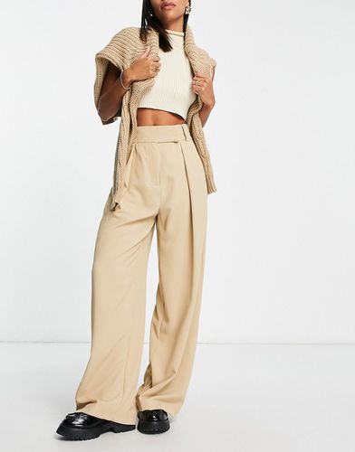 Pantalon d'ensemble coupe large à pinces - Beige - River Island - Modalova