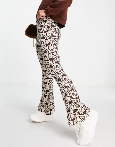 Pantalon évasé à imprimé caurs rétro - Topshop - Modalova