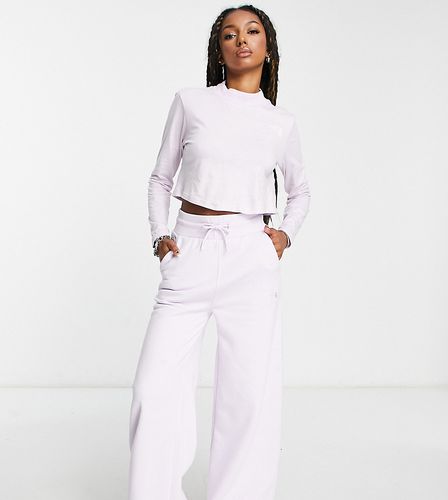 Jogger large en polaire - Lilas - Exclusivité ASOS - The North Face - Modalova