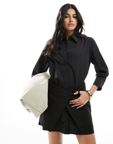 Robe chemise courte à manches longues et jupe superposée - Noir - Urban Revivo - Modalova