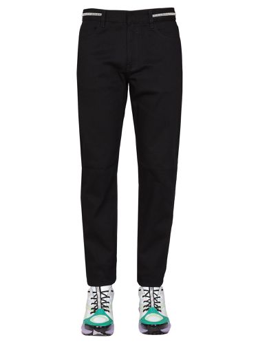 Slim fit jeans with metallic details - givenchy - Modalova