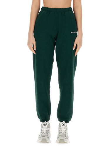 Jogging pants with logo - sporty & rich - Modalova