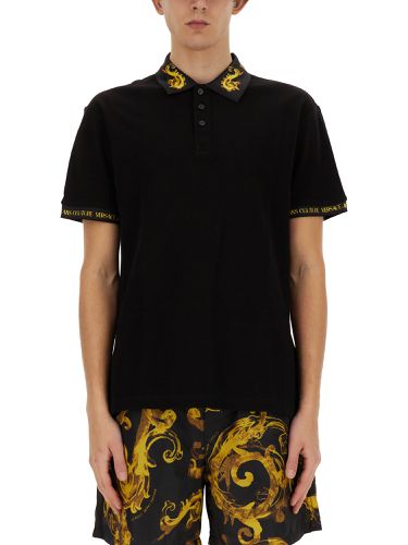 Polo with logo - versace jeans couture - Modalova