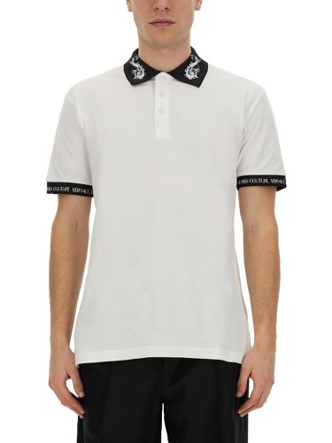 Polo with logo - versace jeans couture - Modalova