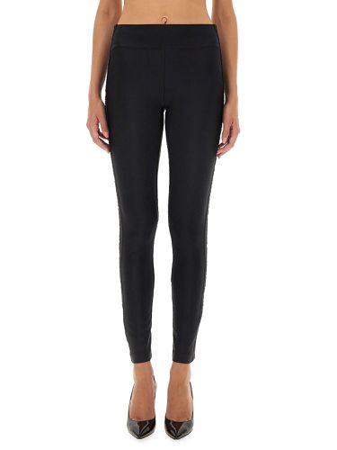 Leggings with logo - versace jeans couture - Modalova