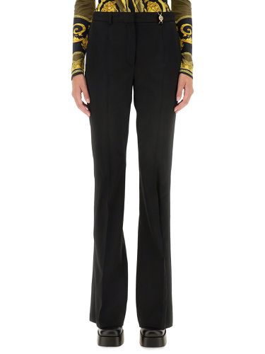 Versace slim fit pants - versace - Modalova