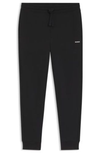 Pantalon casual en coton avec poignets élastiques - HUGO - Modalova