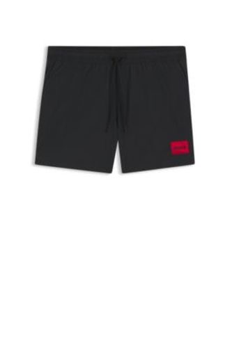 Short de bain à séchage rapide avec étiquette logo rouge - HUGO - Modalova