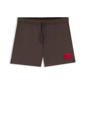 Short de bain à séchage rapide avec étiquette logo rouge - HUGO - Modalova