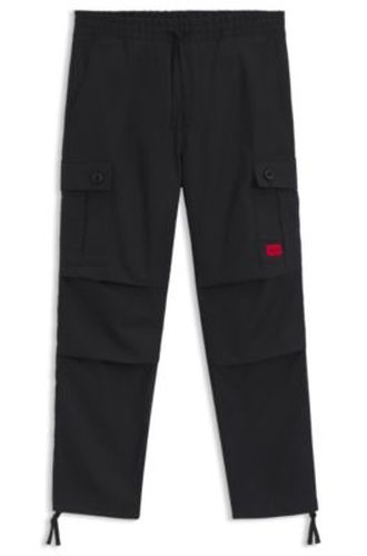 Pantalon cargo Slim Fit en coton ripstop - HUGO - Modalova